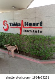 The Tabba Heart Institute Logo On Its Wall Over A Plant Fence   - Karachi Pakistan - Apr 2021