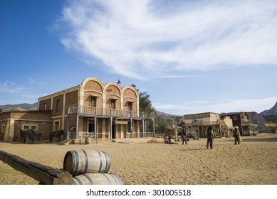 TABERNAS DESERT, ALMERIA, SPAIN - September 19, 2014: Filming Cowboy Duel For A Western Movie. Wild West Town Set.