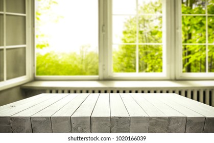 Table background of free space and window with spring view. Empty place for your product or text.  - Shutterstock ID 1020166039