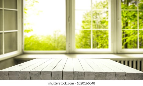 Table background of free space and window with spring view. Empty place for your product or text.  - Shutterstock ID 1020166048