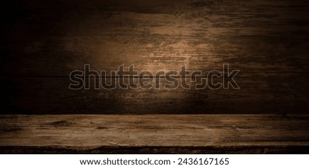 table background of free space for your wine bottle or food on top and dark retro interior of barrels . High quality photo