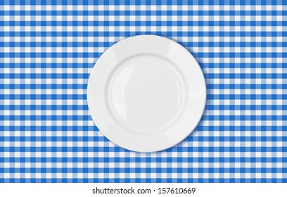 Table With Blue Picnic Cloth And Plate Top View