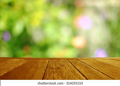 Table with blur nature backdrop