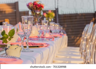 Table And Chairs Baby Or Bridal Shower Event Decor With Glasses And Pink Flowers Outdoors