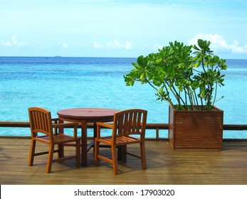 Table And Chairs At Seaside