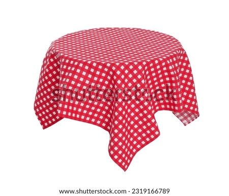 Table with checkered tablecloth isolated on white