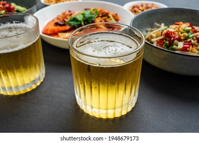 A Table Of Chinese Home Cooking And Beer