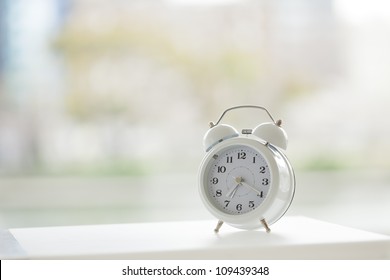 The Table Clock Which Is Put In The Room