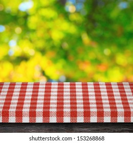 Table Cloth And Autumn Background