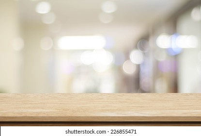 Table, Counter At Store, Background For Product Display Template, Empty Wood Desk, Shelf, Counter Over Blur Retail Shop With Abstract Bokeh Light Background, Wooden Table Top And Blur Store Backdrop