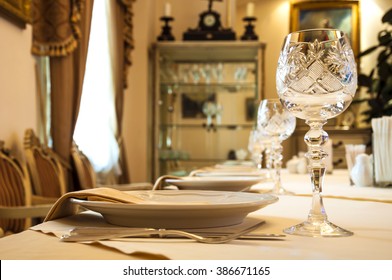 
table decor, beautiful glasses, 
table setting in restaurant