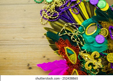 Table Decorated For Mardi Gras Party.