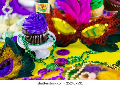 Table Decorated For Mardi Gras Party.