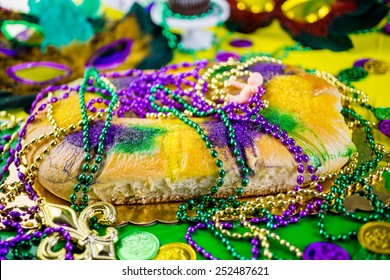 Table Decorated For Mardi Gras Party.