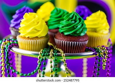 Table Decorated For Mardi Gras Party.