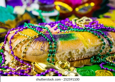 Table Decorated For Mardi Gras Party.