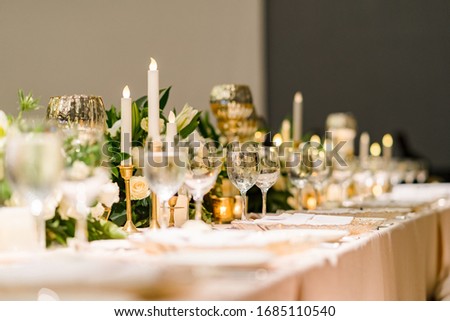 Table decorations for a lavish and festive dinner.