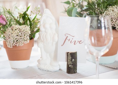 Table Decorations With Rustic Table Number Holder.