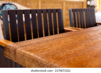 Table empty background in cafe ,restaurant background.Front view. . Dining table. Brochure background.Bar outside in summer vacation 