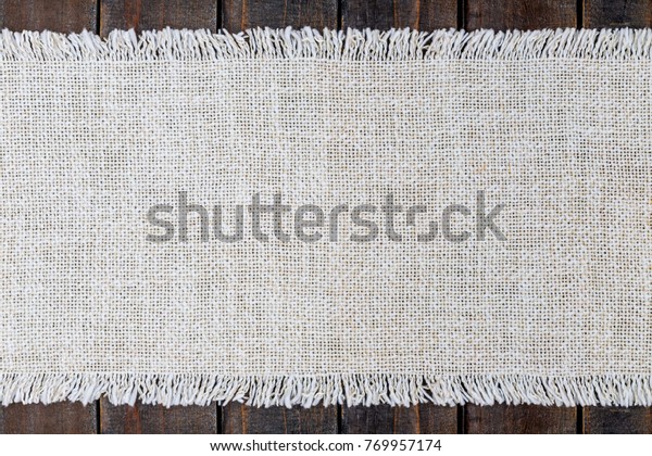 Table fabric linen Runner on wooden table rustic
background, copy space  