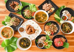 Table Food Served On The Table Tradition Thai Food Delicious With Fresh Vegetables, Many Variety Various Thai Menu On Plate And Wooden Table, Asian Food Top View