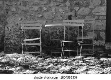 Table in front of stone wall