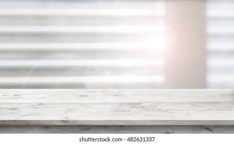 Table In Front Of A Window With Sunlight