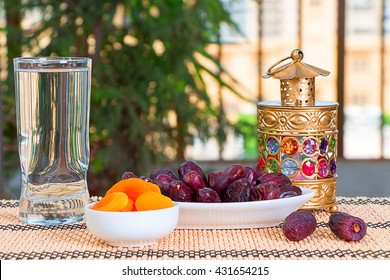 Table With Fruits - Dates And Apricots , With A Glass Of Water Ready For Iftar Happy Breakfast In Ramadan