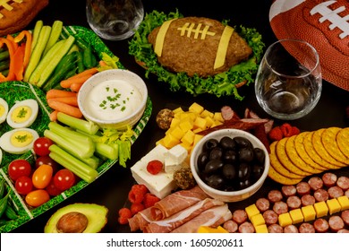 Table Full Of Delicious Snack For Football Game Watching Party For Fans.