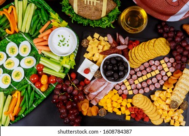 Table Full Of Delicious Snack For Football Game Watching Party For Fans.