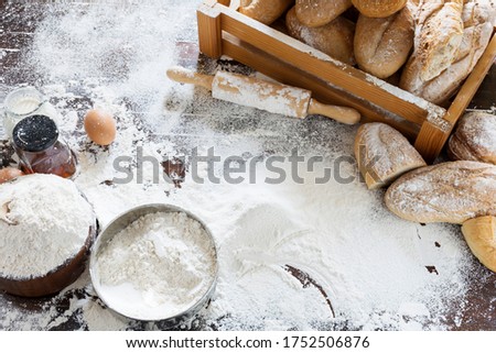 Table full of flour and bread