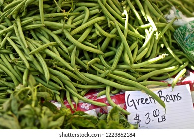 Table Full Of Fresh Organic Green Beans With Price Sign At Madison Wisconsin Farmers Market 