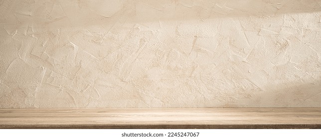 A table in the kitchen against a stone wall in the morning sunlight