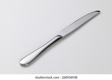 Table Knife On The White Background