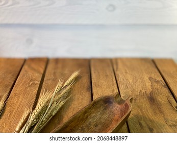 A Table Made Of Oak Boards You Can See The Rings On Them There Is A Bunch Of Corn And A Spoon A Wooden Wall Made Of Pine Boards Painted White