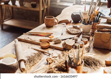 Table With Materials And Tools For Pottery Making Craftsperson Workspace Isolated No People Creative Studio Side View Close-up