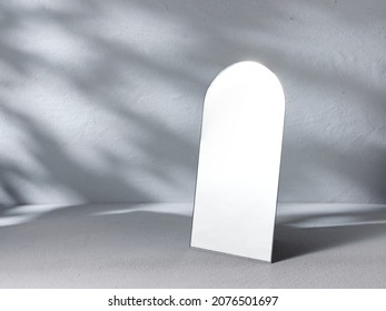 Table mirror on gray background - Shutterstock ID 2076501697