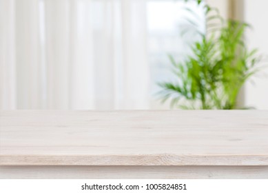 Table Mockup For Display Of Product Over Blurred Window Background