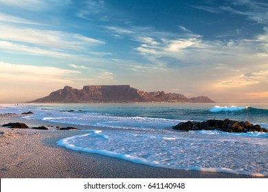 Table mountain in cape town south africa scenic view from bloubergstrand at sunset