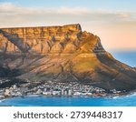 Table Mountain landscape in Cape Town with iconic flat-top peak overlooking city and ocean. Famous South African landmark ideal for travel, nature, and outdoor photography.
