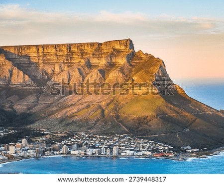 Table Mountain landscape in Cape Town with iconic flat-top peak overlooking city and ocean. Famous South African landmark ideal for travel, nature, and outdoor photography.
