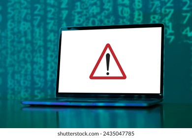 Table With a Notebook Computer Screen That Displays a Symbol which May Mean One of The Following Messages. Caution, Attention, Warning, Error, Halt