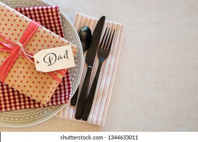 Table Place Setting For Dad For A Birthday Party Or Father's Day Celebration Dinner And Background Room Or Space For Copy, Text Or Words.  Horizontal With Flay Layout And Above View