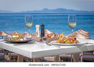 Table In The Restaurant With Mediteranina Food Near The Sea