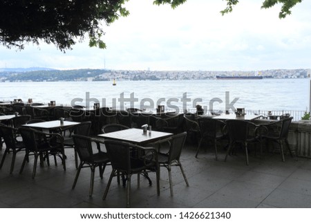 table in restaurant near river 