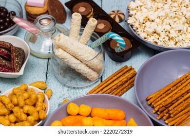 Table Of Salty And Sweet Snacks. Large Group Of Unhealthy Food