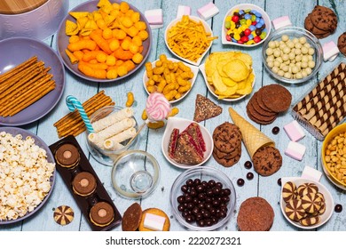 Table Of Salty And Sweet Snacks. Large Group Of Unhealthy Food