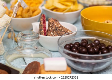 Table Of Salty And Sweet Snacks. Large Group Of Unhealthy Food