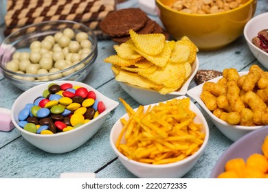 Table Of Salty And Sweet Snacks. Large Group Of Unhealthy Food