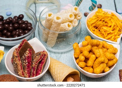 Table Of Salty And Sweet Snacks. Large Group Of Unhealthy Food